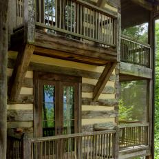 Covered Balconies on Rustic Log Cabin Home