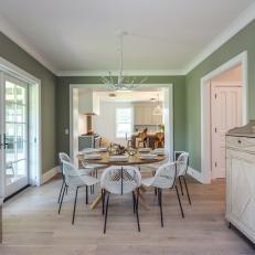 Green Contemporary Dining Room With Mesh Chairs