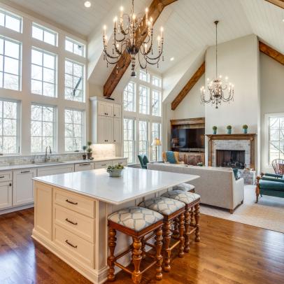 White Country Open Plan Kitchen With High Ceiling