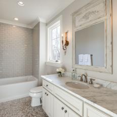 Gray Bathroom With White Mirror