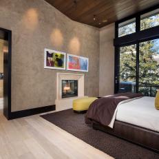 Neutral Contemporary Bedroom Features Colorful Art and Accents