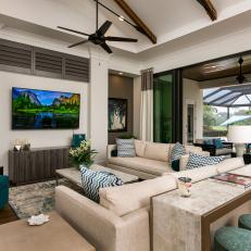 Transitional Living Room With A View To The Private Pool
