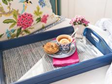 Give a basic tray a colorful makeover (on the cheap!) to create a beautiful, spill-proof surface that's perfect for enjoying a light snack while you snuggle under the covers bingeing your favorite show or curled up with a good book.