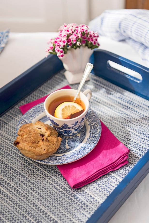 Inexpensively upcycle a bland tray and a bit of leftover fabric into a designer-worthy tray ready for breakfast-in-bed any day.