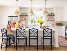 This sparkling kitchen, complete with globe pendants and patterned seats, was featured in HGTV Magazine.
