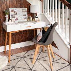 Small Writing Desk Paired With Dining Chair Fit Neatly Into Corner of Foyer