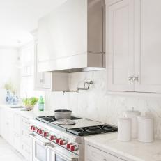 White Chef Kitchen With White Canisters