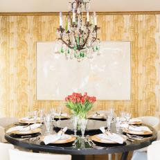 Gold Art Deco Dining Room With Black Table