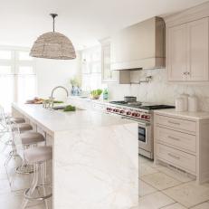 White Chef Kitchen With Lucite Barstools