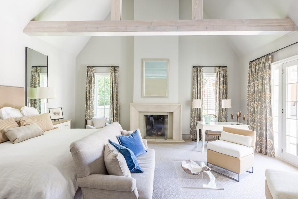 Neutral Transitional Main Bedroom With Beams
