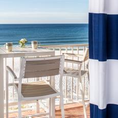 Oceanfront Balcony and Striped Curtains