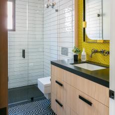 Modern Guest Bath with Bold Yellow Backsplash