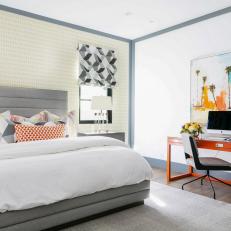 Modern Guest Bedroom with Bold Orange Desk