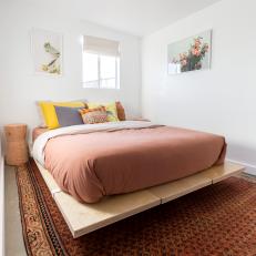 Southwestern Bedroom With Orange Rug
