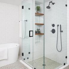 Black and White Master Bathroom With Graphic Floor