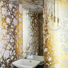Gold Powder Room With Wallpaper