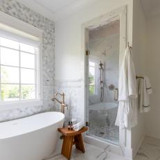 Gray Spa Bathroom With Wood Stool