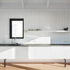 Sink and White Paneled Walls