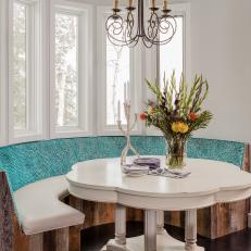 Eclectic Breakfast Room with Teal Banquette