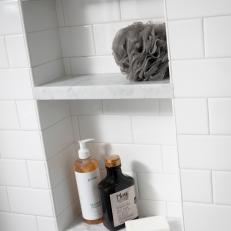 Marble Shower Shelves With Gray Pouf