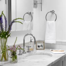 Gray Bathroom Vanity and Purple Flowers
