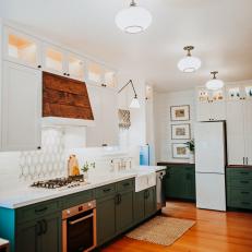 Farmhouse Kitchen With Green Cabinetry 