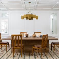 Contemporary Dining Room With Gold Pendant
