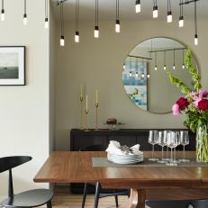 Contemporary Dining Table With Modern Light Fixture