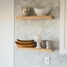 Contemporary White Kitchen with Gray Tile Backsplash and Neutral Floating Shelves 