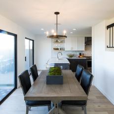 Contemporary Neutral Dining Room with Brown Table and Black Chairs 