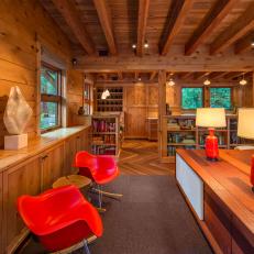Cabin Living Area With Red Chairs