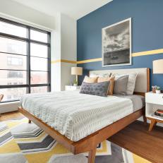 Modern Guest Bedroom With Navy Blue Accent Wall