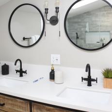 Neutral Rustic Master Bathroom with WHite Countertop and Black Faucets 