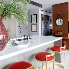 Kitchen With Red Barstools