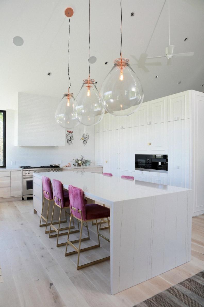 White Kitchen With Pink Furry Stools