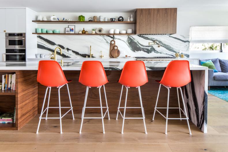Close Up Of  High-Back Chairs At Modern Marble Kitchen Island