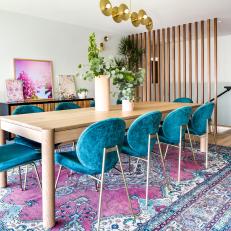 Modern Dining Area With Brass Chandelier