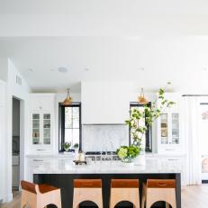 White Chef Kitchen With Brown Barstools