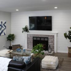 Contemporary White Living Room with White Fireplace and Shiplap Walls