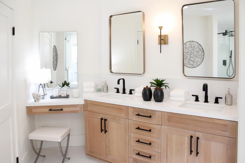 White Master Bathroom with White Quartz Countertop, Two Mirrors