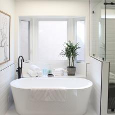 White Contemporary Master Bathroom with Freestanding White Tub 