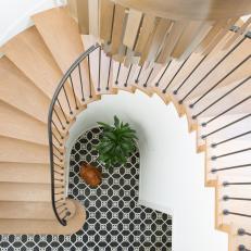 Spiral Stairs and Black Tile Floor