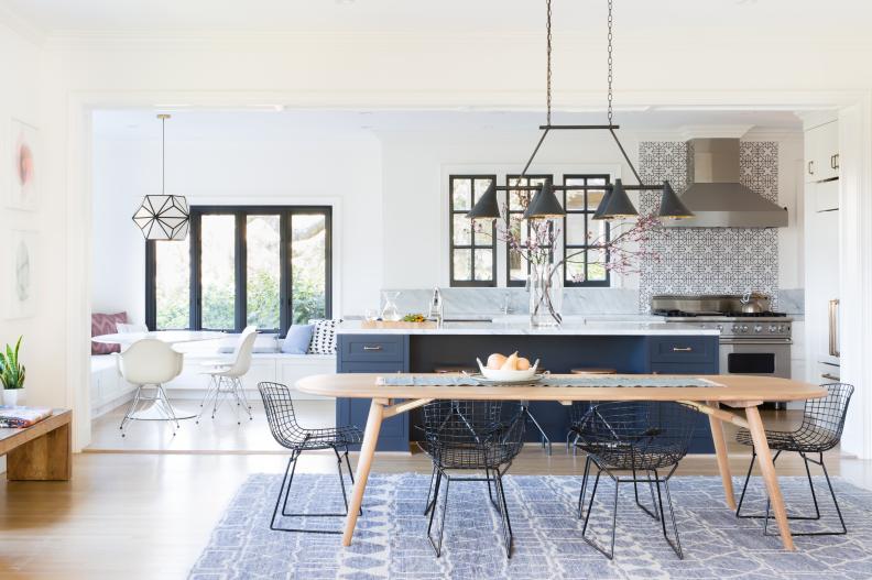 Kitchen and Dining Area With Blue Rug