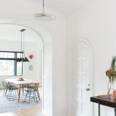 Mediterranean Foyer With Arched Door