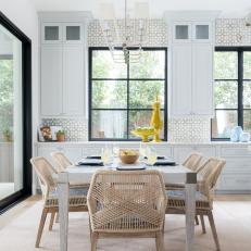 Open Plan Neutral Dining Area With Yellow Bowl