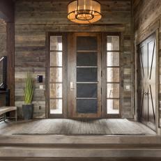 Rustic Entryway With Modern Chandelier