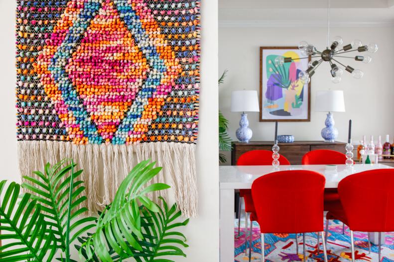Red Chairs in Contemporary Dining Room, Colorful Woven Wall Art