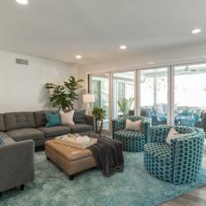 Gray Mid-Century Modern Living Room with Blue Rug 