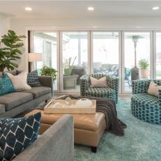 Gray Mid-Century Modern Living Room with Gray Sofa and Blue Arrmchairs 