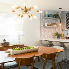 Neutral Mid-Century Modern Dining Room with Two White Lamps 